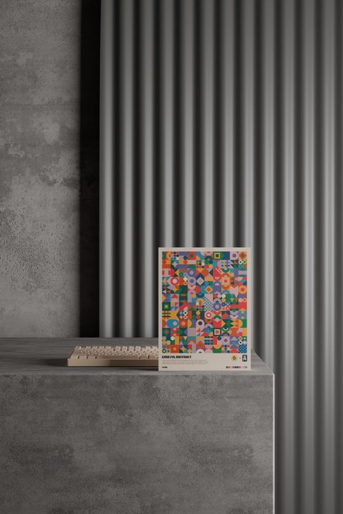 3D-rendered keyboard and geometric-pattern poster staged on a concrete plinth against a corrugated backdrop