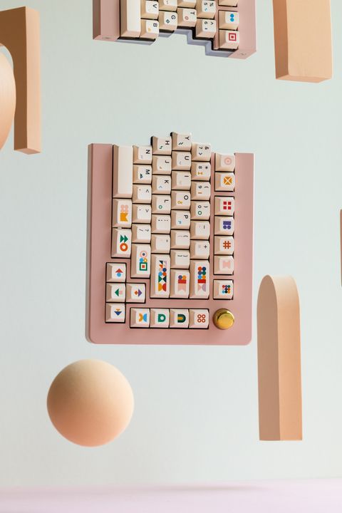 The right half of the board floating over a peach sphere, the left half drifting out of frame above it