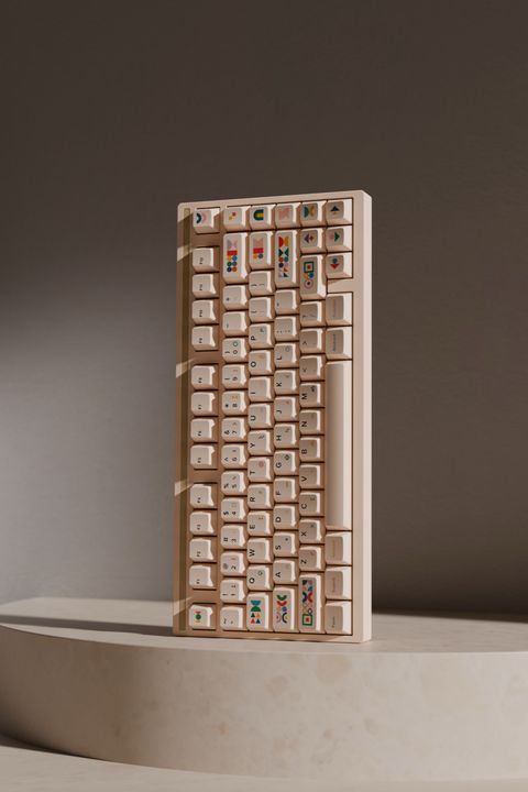 3D-rendered cream keyboard with abstract keycaps standing upright on a pedestal, shown from a low angle