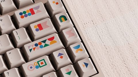 Close-up across the keys at an angle, showing the shape novelties and the small sub-legends