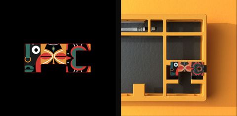 Tribal-pattern badge graphic beside a yellow keyboard with the badge mounted on its case