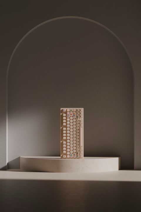 Close-up of the keyboard standing upright on a stone plinth inside a shadowed arch