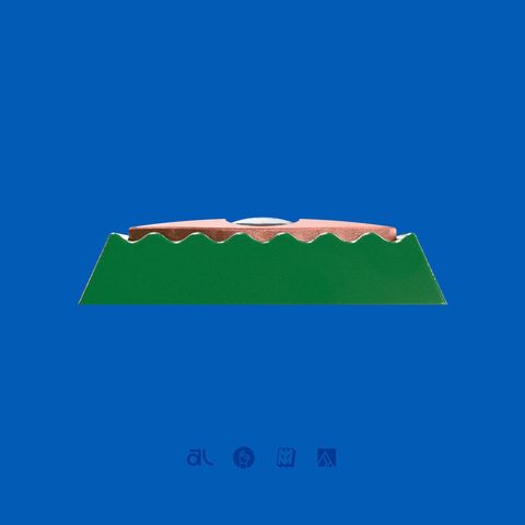 The artisan in profile on a blue background, showing its low sculpted silhouette