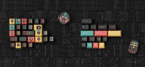 3D-rendered keycap flat-lay and closeup mask novelty against a dark tribal-pattern backdrop